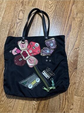 Prada handbag/tote. In excellent condition. Embroidered with unique details